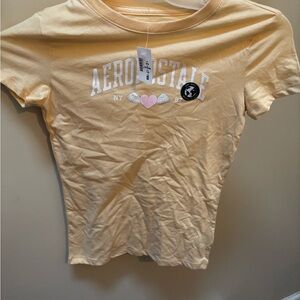 New with tags. Aéropostale Yellow Graphic Tee with Pink Heart